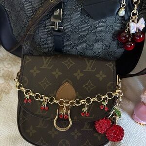 Luxury Brown Designer Crossbody Bag with Gold Accents
